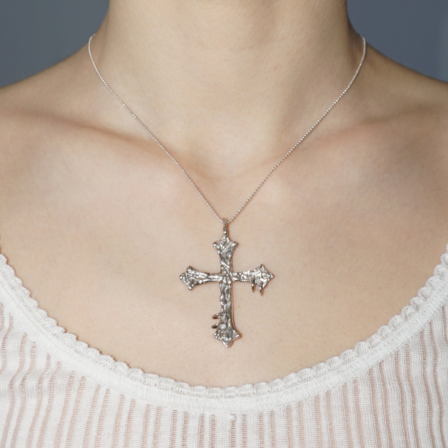 PIERCED CROSS