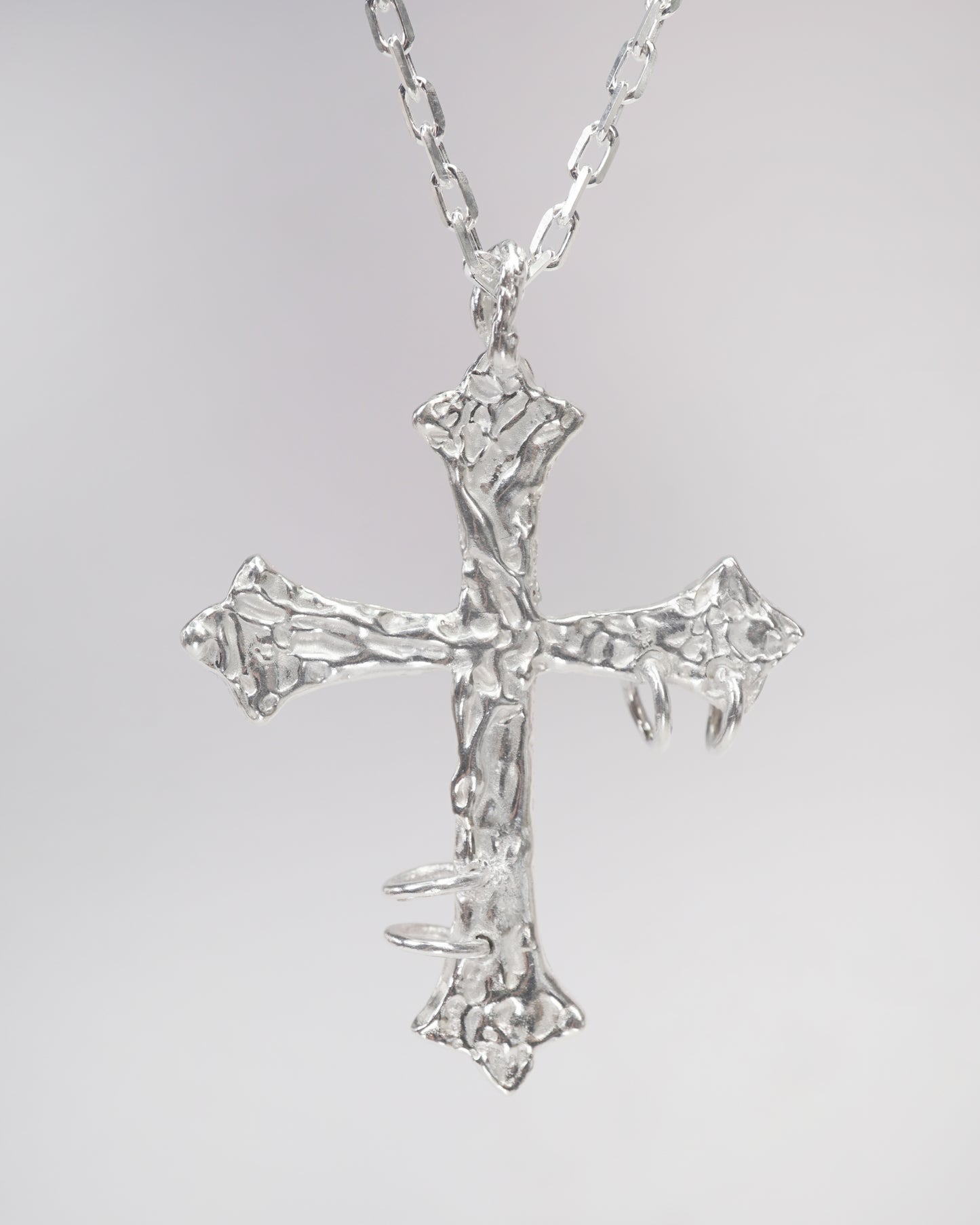 PIERCED CROSS